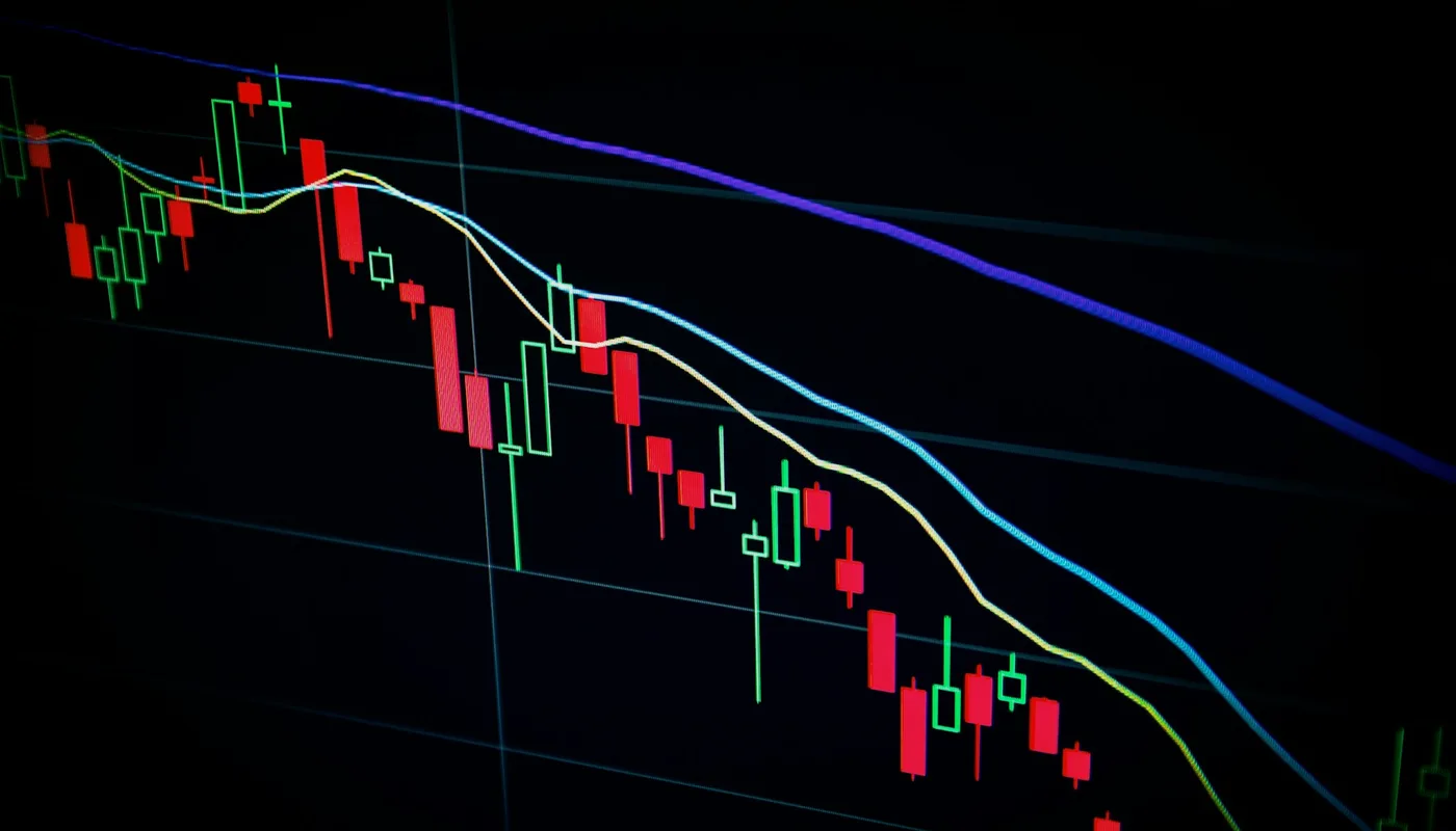 Financial charts on a dark screen representing practical business evaluation